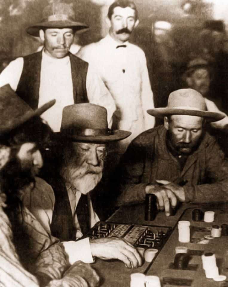 men playing poker around a table