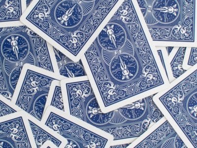 poker cards with blue and white backs