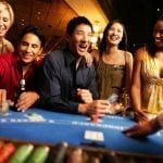 a group of people gambling